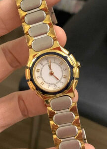 Yves Saint Laurent, YSL 59463835, Gold Case W/ Black Accents on Bezel, White Dial, Quartz Movement & Two Tone Stainless Steel Bracelet w/ Butterfly Clasp | EKT0431